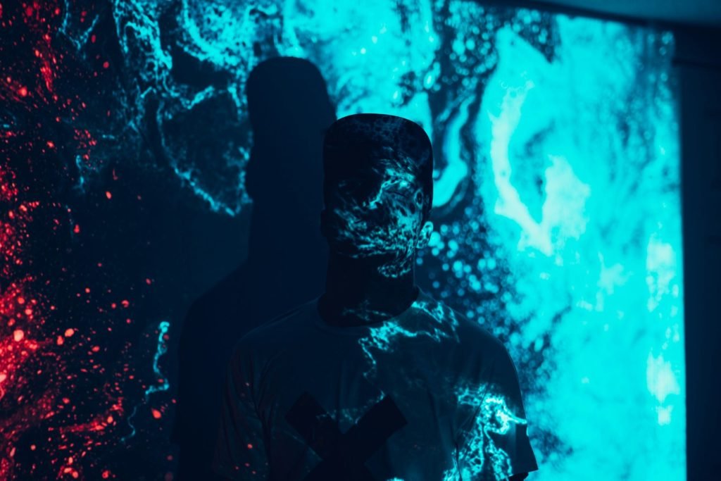 Face lit by a digital projection