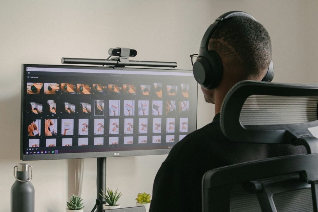 Editor reviewing many product images