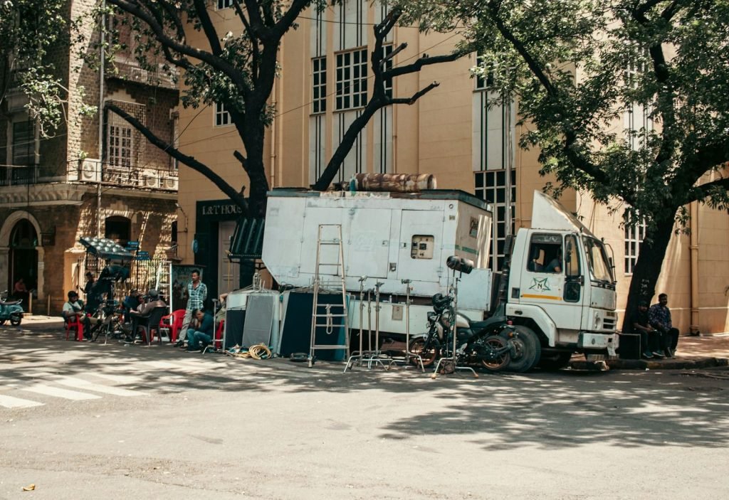 Production truck and gear on a city street